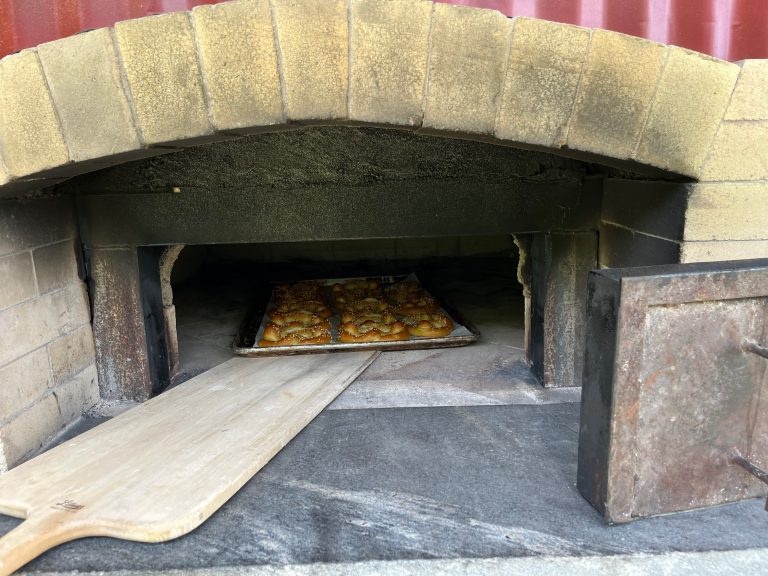 pretzels in woodfired oven and peel