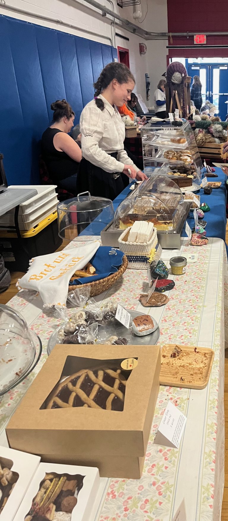 display of cookies and cakes at winter market